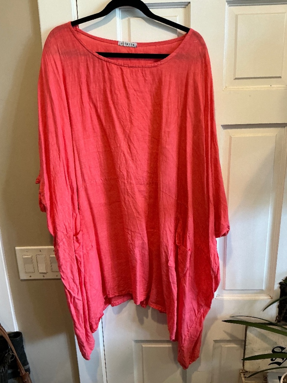 Colette oversized tunic top in a beautiful coral color.  Open size up to plus
